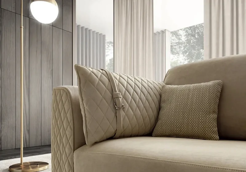 Canapé design capitonné beige ELFY