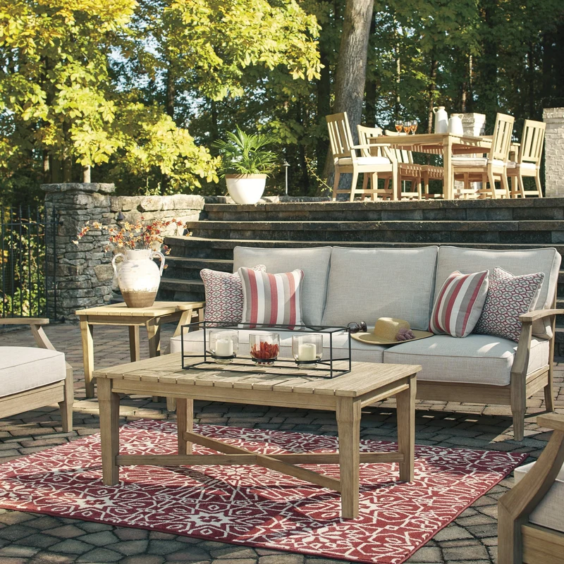 Sofa extérieur en tissu Nuvella beige pâle et en bois d'eucalyptus avec coussins - Clare view