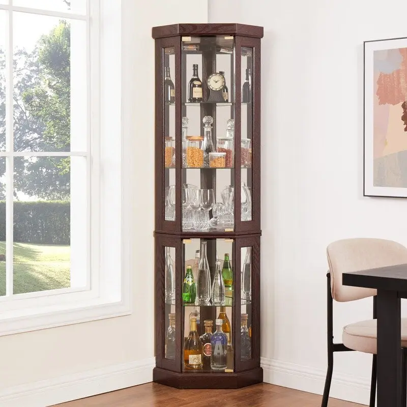 Vitrine d'angle élégante avec éclairage intégré Idéale pour exposer des objets de collection, de la verrerie ou des éléments de décoration.