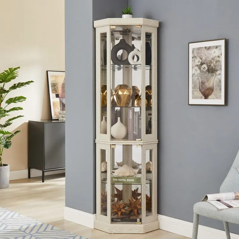 Vitrine d'angle élégante avec éclairage intégré Idéale pour exposer des objets de collection, de la verrerie ou des éléments de décoration.