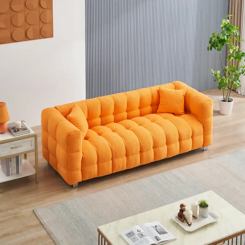 Canapé 3 places orange 80 avec deux coussins et pieds robustes en métal