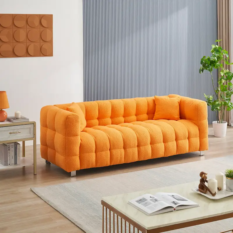 Canapé 3 places orange 80 avec deux coussins et pieds robustes en métal