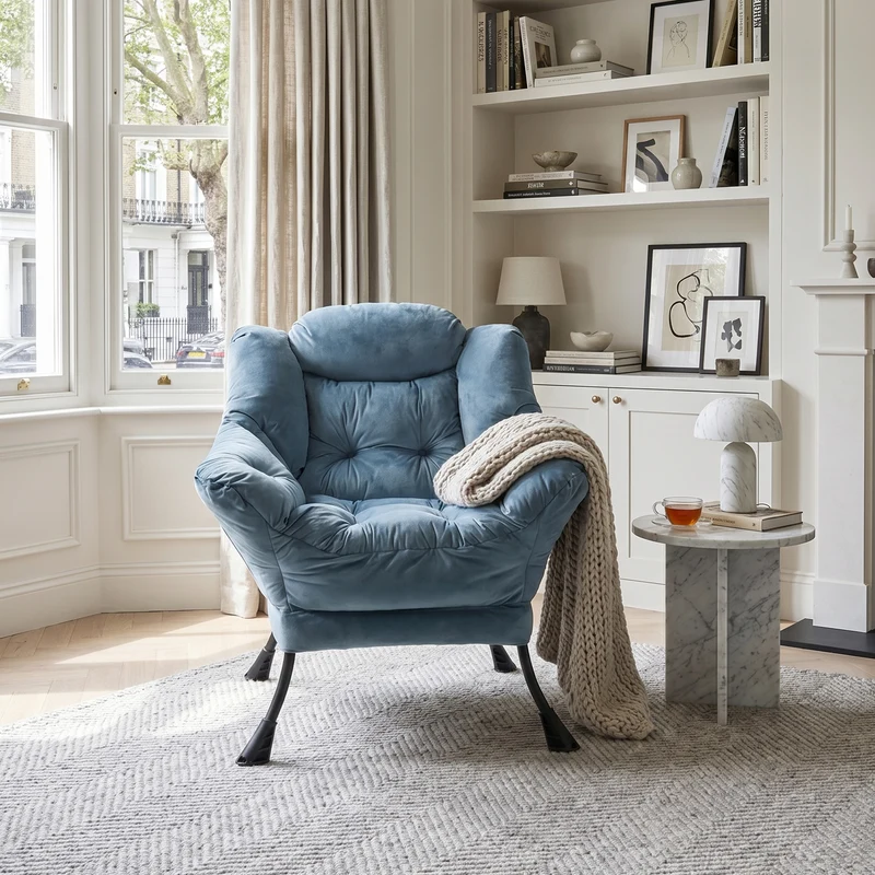 Fauteuil rembouré tissu bleu clair en pieds métal poche latérale 75x80x85cm BOOKCASECONCRETE