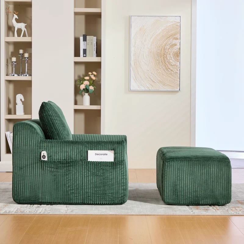 Canapé simple fauteuil XXL en velours côtelé vert, dossier profond, repose pied, coussin & poches latérales, sans montage MILKWEEDFLOSS