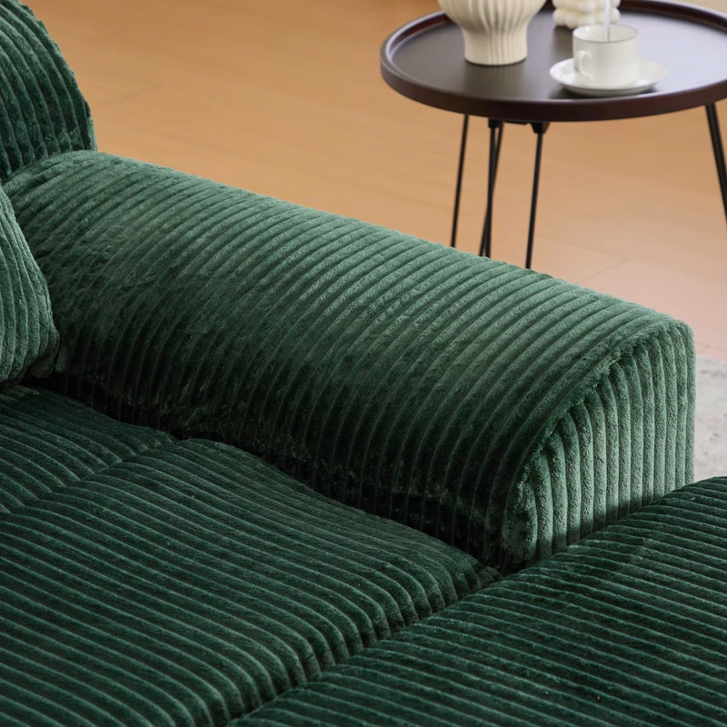 Canapé simple fauteuil XXL en velours côtelé vert, dossier profond, repose pied, coussin & poches latérales, sans montage MILKWEEDFLOSS